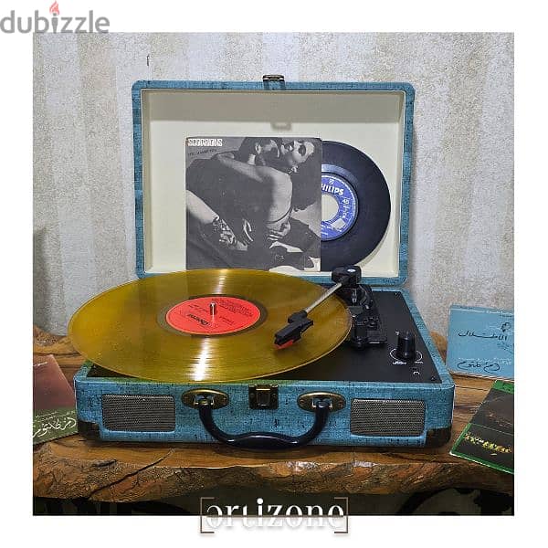 Turntable, vinyl record player  مشغل اسطوانات 1