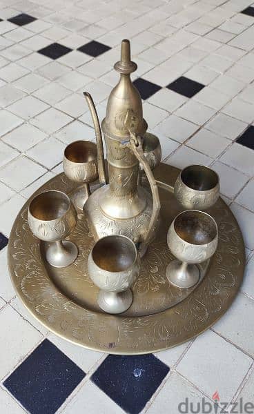 Antique 8 piece Brass Set finely tooled and etched. (Revised Price)