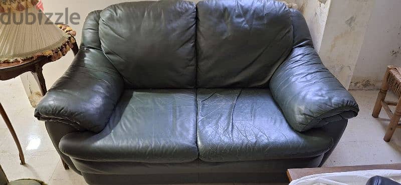 Salon green leather 3 couches in good condition. 1