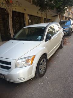 One owner White Dodge caliber for sale