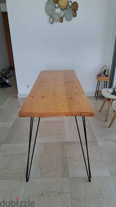 Wooden and wrought iron table