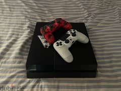 regular ps4 for sale with 2 consoles