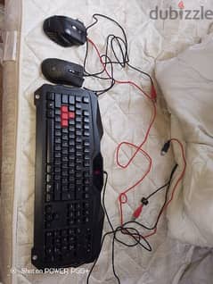 bloody gaming keyboard and 2 gaming mouses