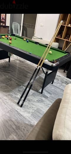 billiard table with the balls and accessories