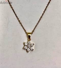 gold and diamond pendant