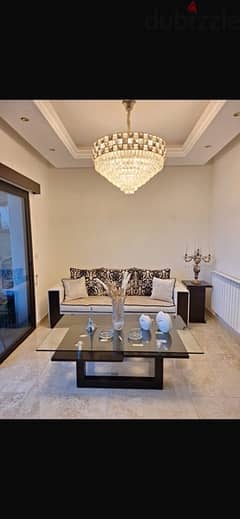 classy living room + glassy table