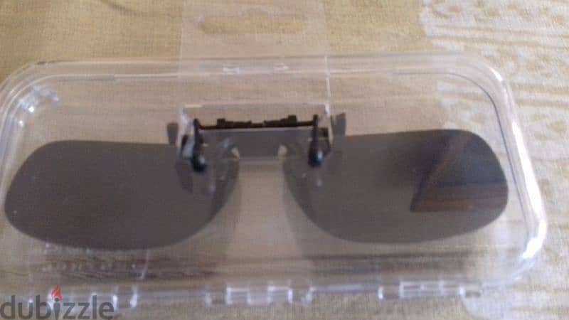 Clip-On Shade Control glasses. 1