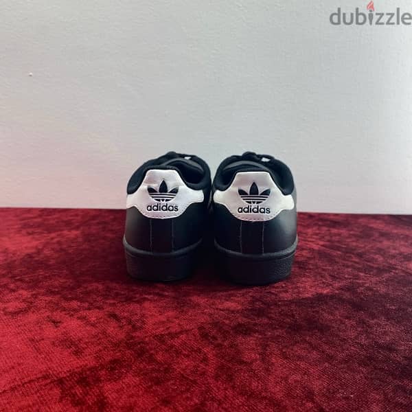 ADIDAS Superstar Black & White Sneakers. 5