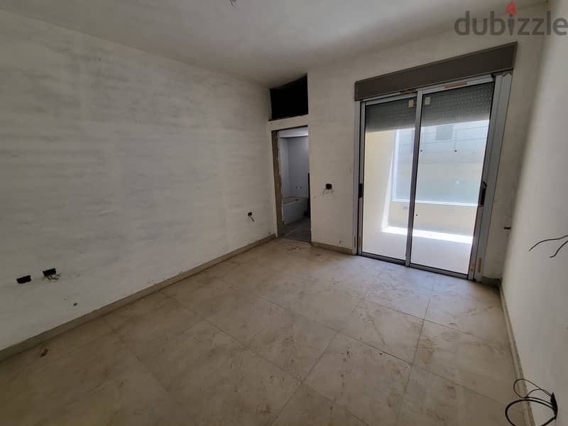 RWK101AM - Apartment For Sale In Haret Sakher - شقة للبيع في حارة صخر 4