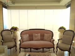 pink velour sofa with a set of two pink velour chairs