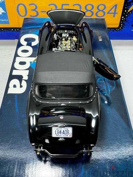 1/18 diecast EXOTO AC Cobra 289 Roadster Soft Top. Black on Black 5