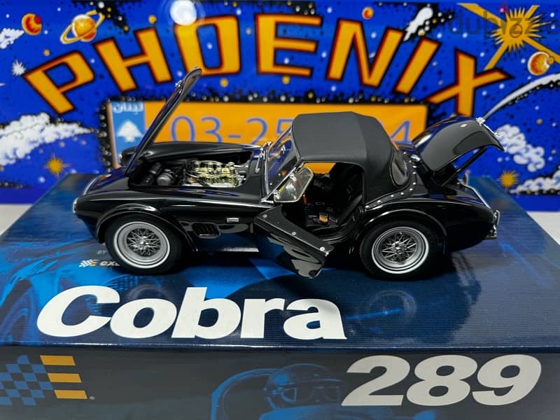 1/18 diecast EXOTO AC Cobra 289 Roadster Soft Top. Black on Black 18