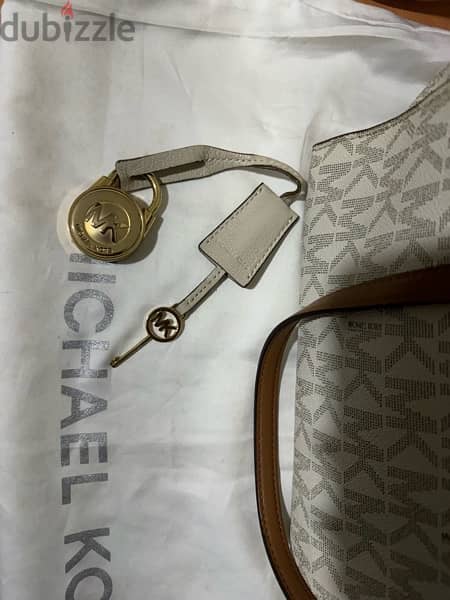 michael kors original gold-tone lock and key handbag access 75$ at abc 1