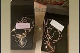 Brand new Bella. Jack white and pink heart necklaces