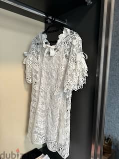 a chic white short sleeve lace dress from italy for baptism or wedding