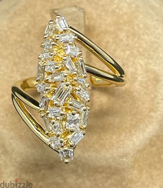 18kt gold ring set with baguette and trapeze D colored diamonds 0