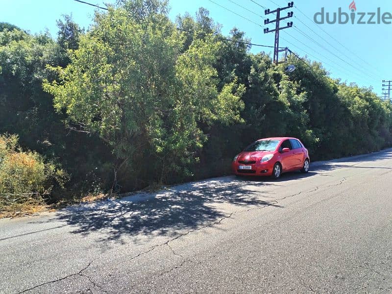 Land for sale in Dhour Halat (Aalita) directly on the highway 1