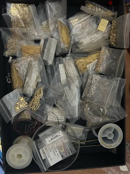 set of beads , tools, and accessories for jeweler making 16