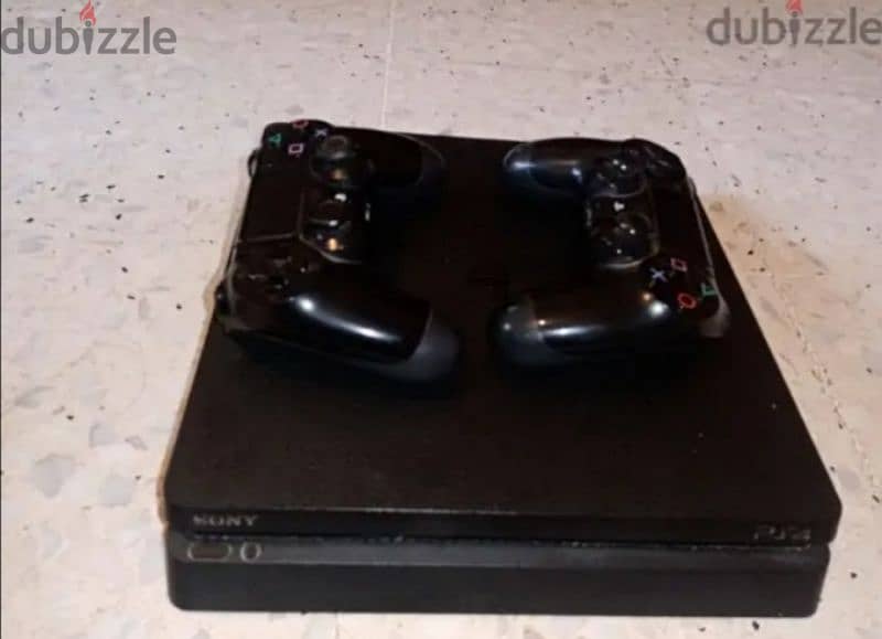 PlayStation 4 slim original with 2 controllers and fifa 18 CD 0