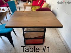 8 wooden tables with black metal legs