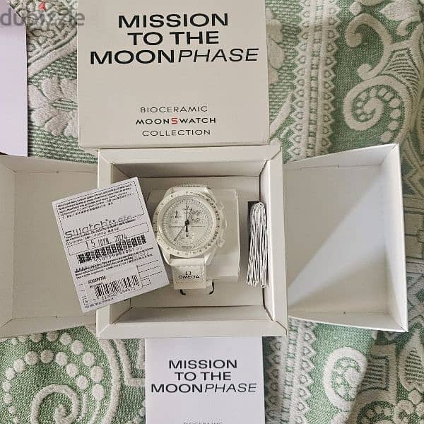 Swatch MISSION ON EARTH LAVA OMEGA (snoopy) Mission on the Moon Phase 1