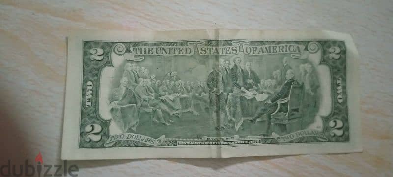 ورقة 2 دولار رقمها 7 وعليها صورة الرئيس الأمريكي توماس جيفرسون 0