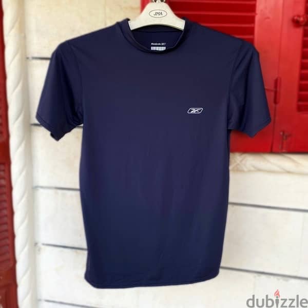 REEBOK Sports Slim Fit T-Shirt. 1