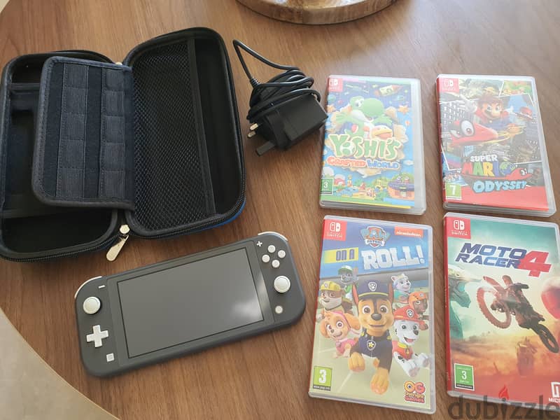 Nintendo switch lite+ 4 games like new 0