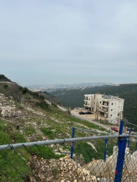 building on the highway near Annayaمبنى ومحلات طريق عام عنايا 14