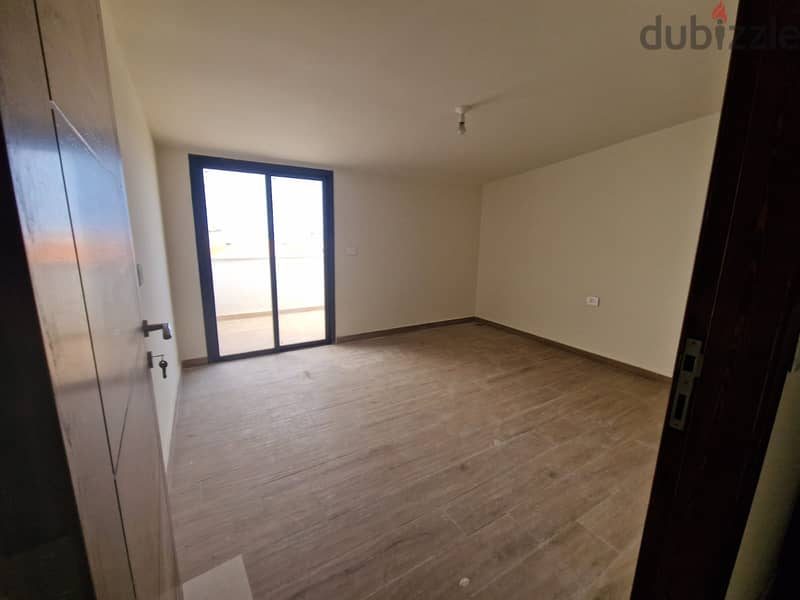 L07826 -Brand New Roof Apartment for Sale in Batroun with Sea View 1