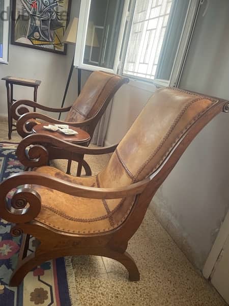 two chairs with leather seatings 2