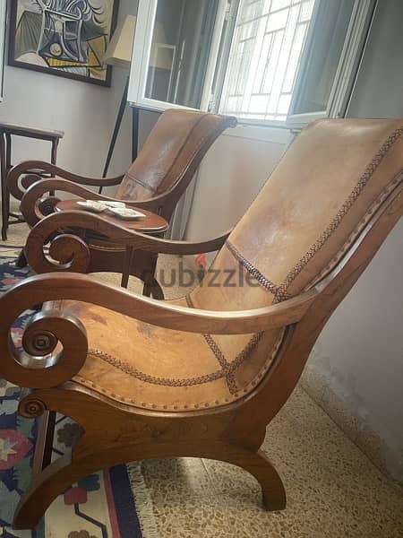 two chairs with leather seatings 4