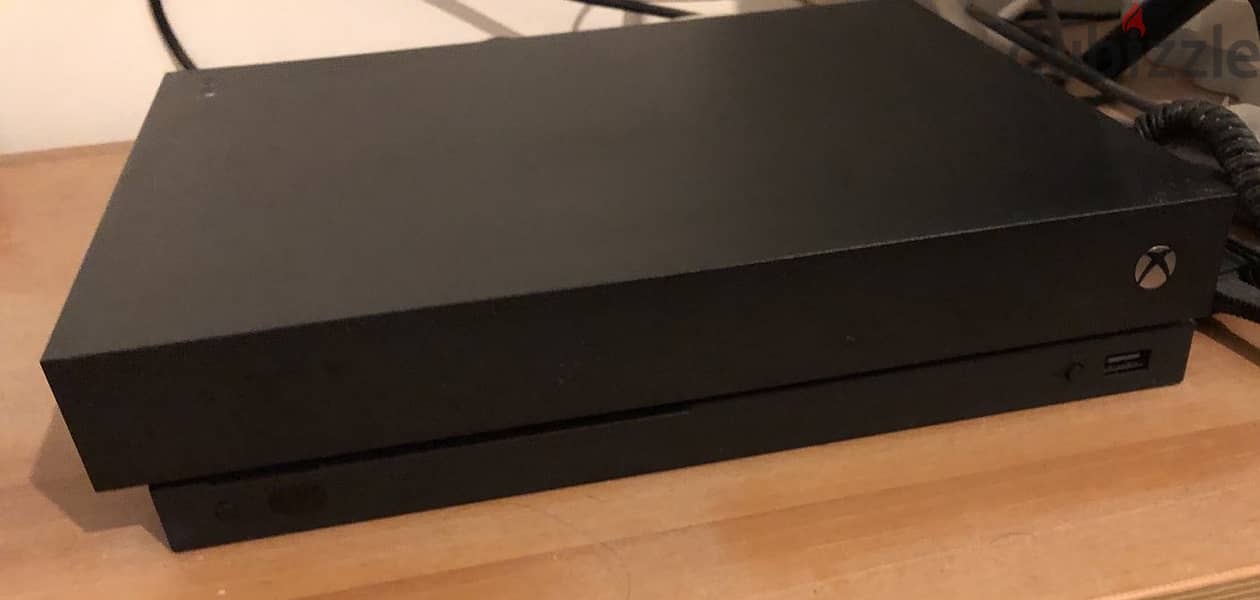 XBOX One X with 9 games 0