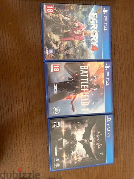 PS4 console (with cables) with 2 controllers and 3 games 1