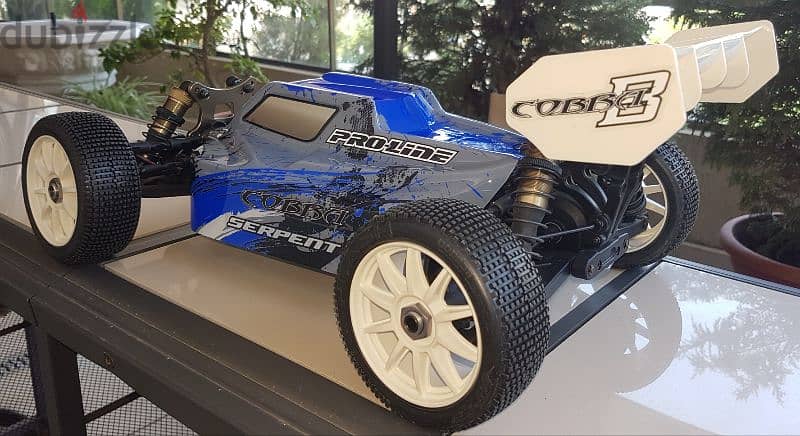exchange on rc car , SERPENT COBRA B , brushless,  new in box 3