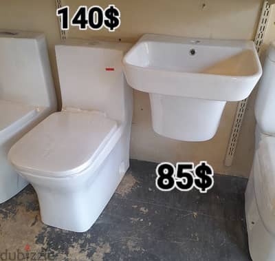 كرسي حمام toyo مع مغسلة تعليق. toilet sets with wall hung sink