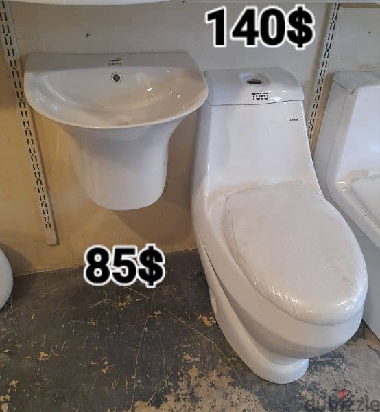 كرسي حمام toyo مع مغسلة تعليق. toilet sets with wall hung sink 1