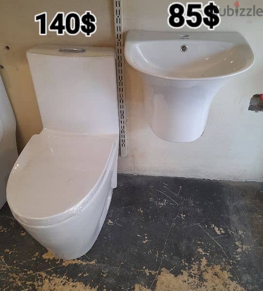 كرسي حمام toyo مع مغسلة تعليق. toilet sets with wall hung sink 2