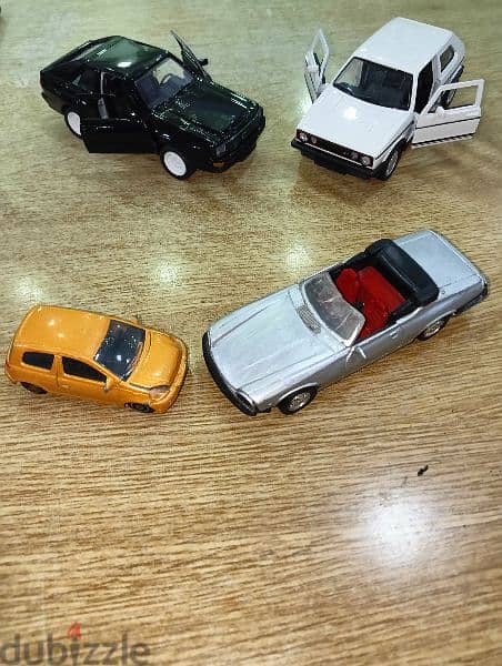 collection of diecast metal car models 0
