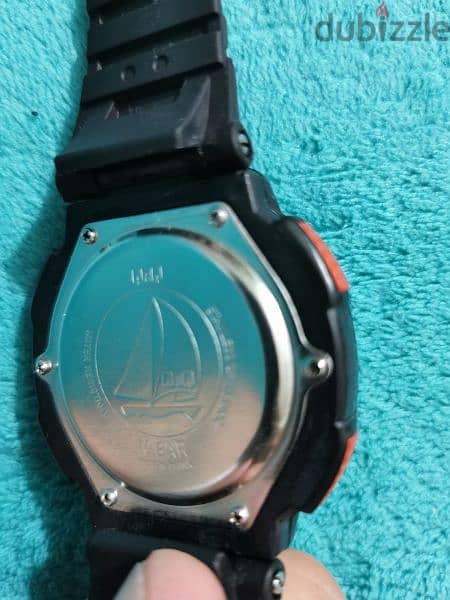 Q&Q watch like g shock water resistant used n a very good condition 4