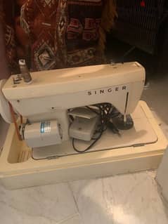 sewing machine singer مكنة خياطة