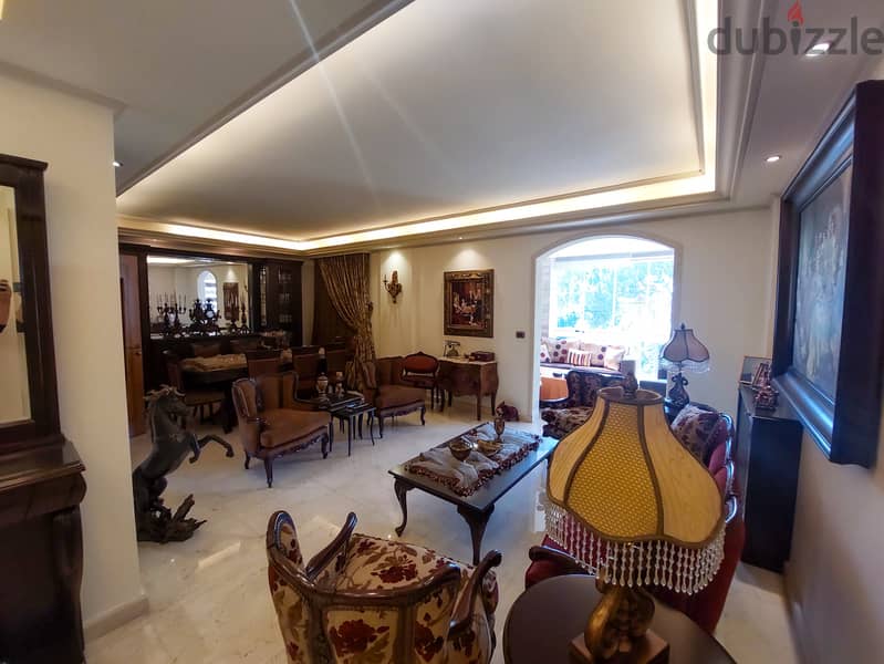 160 SQM Furnished Apartment in Qornet El Hamra with Mountain View 0