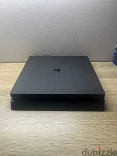 PS4 slim original + 2 controllers  + HDMI and power cable 0