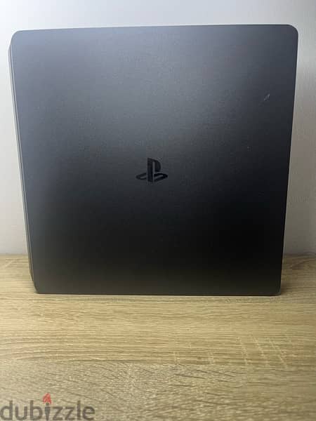PS4 slim original + 2 controllers  + HDMI and power cable 1