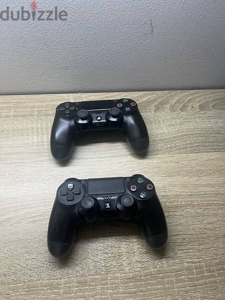 PS4 slim original + 2 controllers  + HDMI and power cable 2