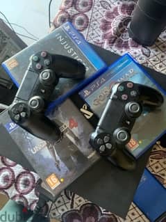 PS4 pro 750GB rarely used with 2 original joysticks and 9 games 0