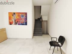 125 SQM Prime Location Shop in Dekwaneh, Metn 0