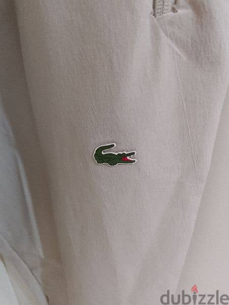 بنطلون رجالي قماش بعدو جديد ماركة LACOSTE قياس XL السعر 15$ 2