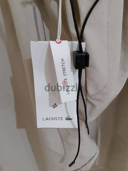 بنطلون رجالي قماش بعدو جديد ماركة LACOSTE قياس XL السعر 15$ 5