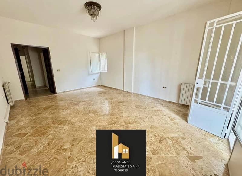 Apartment for sale in Ajaltoun with garden for 65,000$cash/شقة عجلتون 1